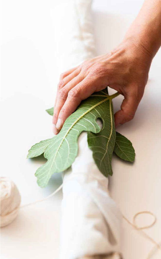 Mano con hoja